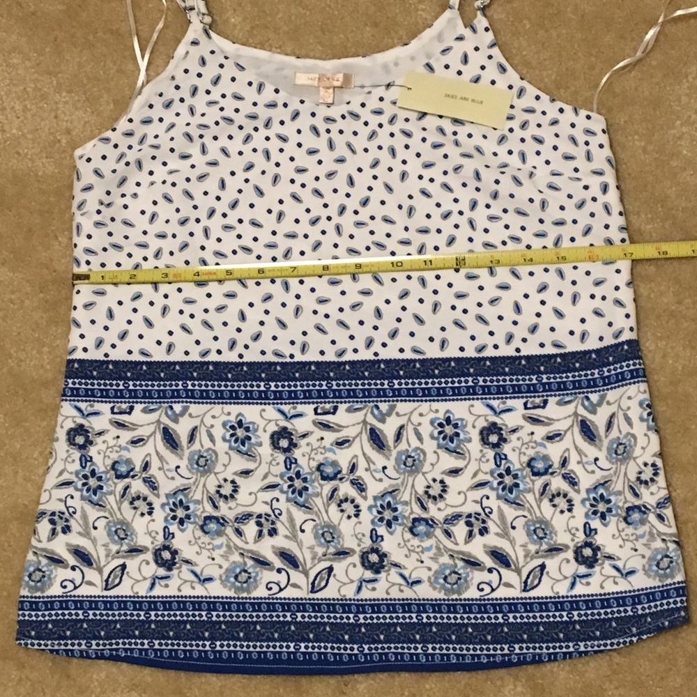 Skies are blue tank top.
